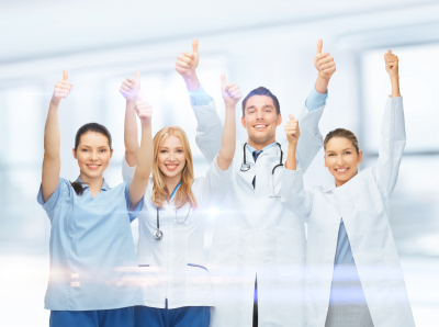 Healthcare and medical professional young team or group of doctors showing thumbs up